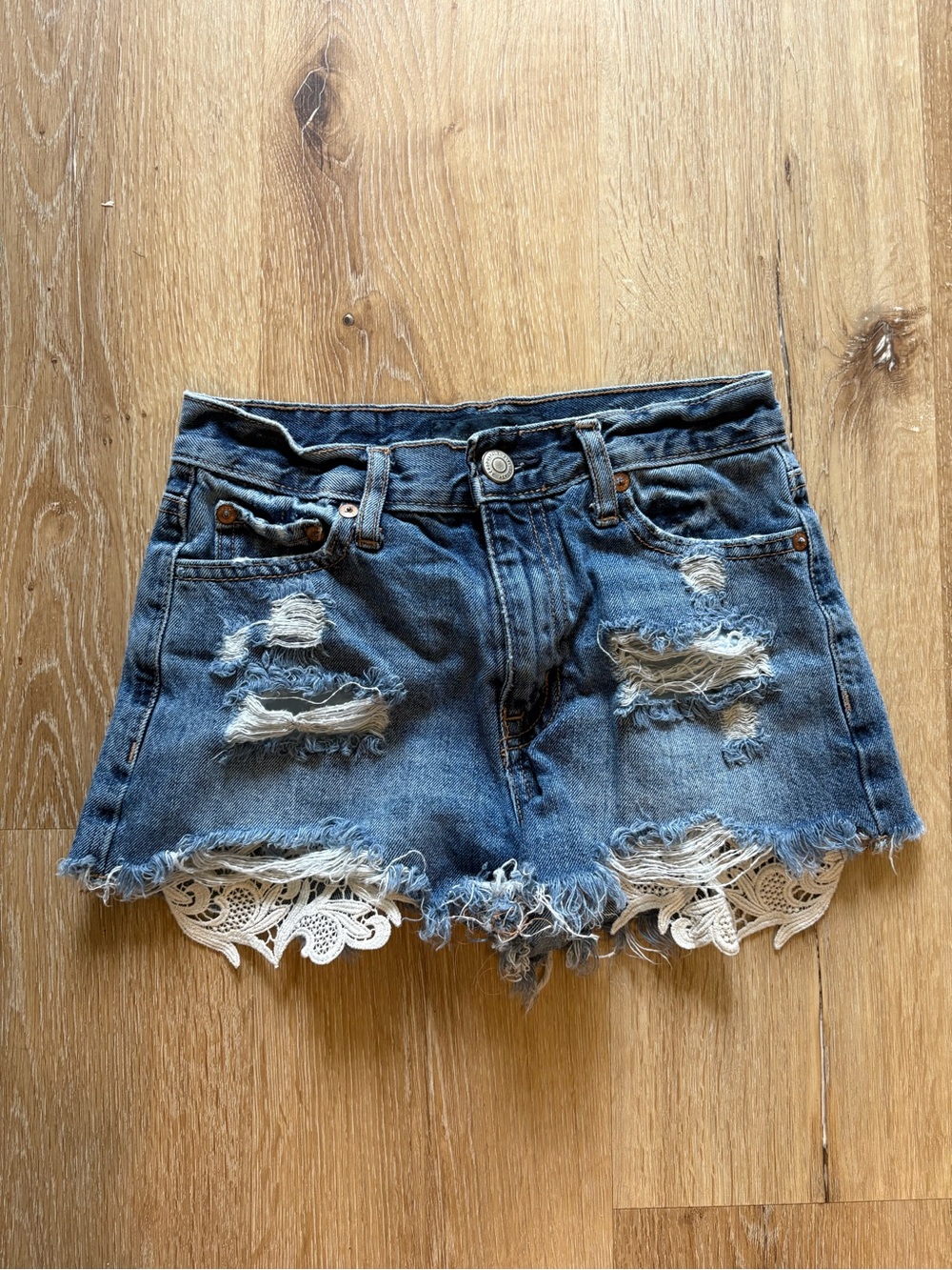 Distressed Denim Festival Shorts with Lace Trim